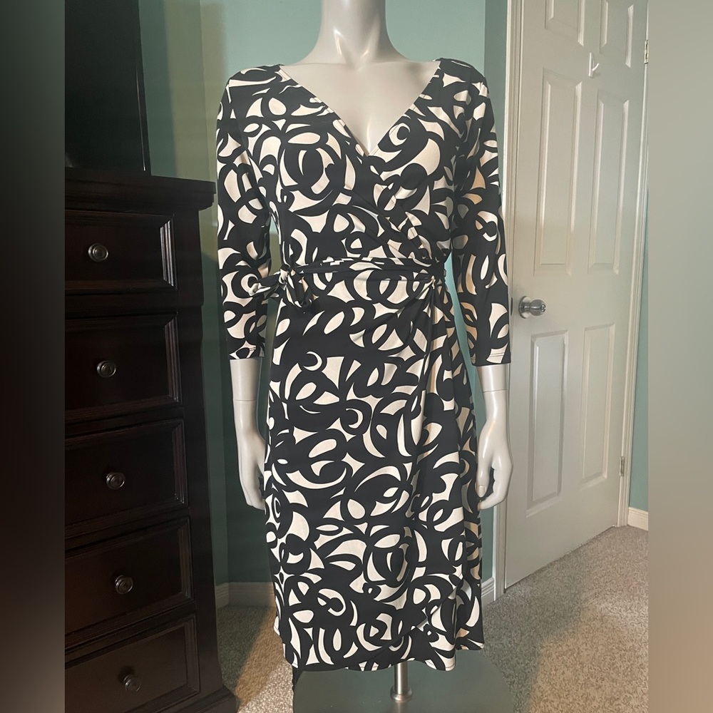 London Times cream and black wrap dress with a hole on the seam- see pics M-L